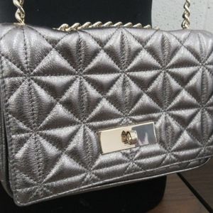 Kate spade whitaker metallic silver crossbody